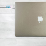 TUDIA Klip for MacBook Charger attached to MacBook-2
