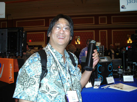 Brian Chee, Infoworld at Jadoo's Booth Holding Fuel Cell
